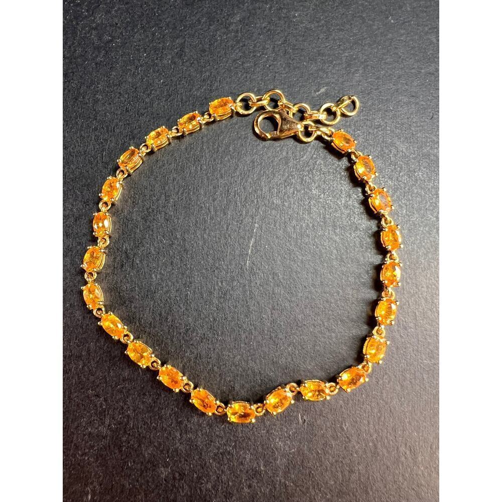 Yellow spessartine garnet tennis bracelet in gold over sterling silver